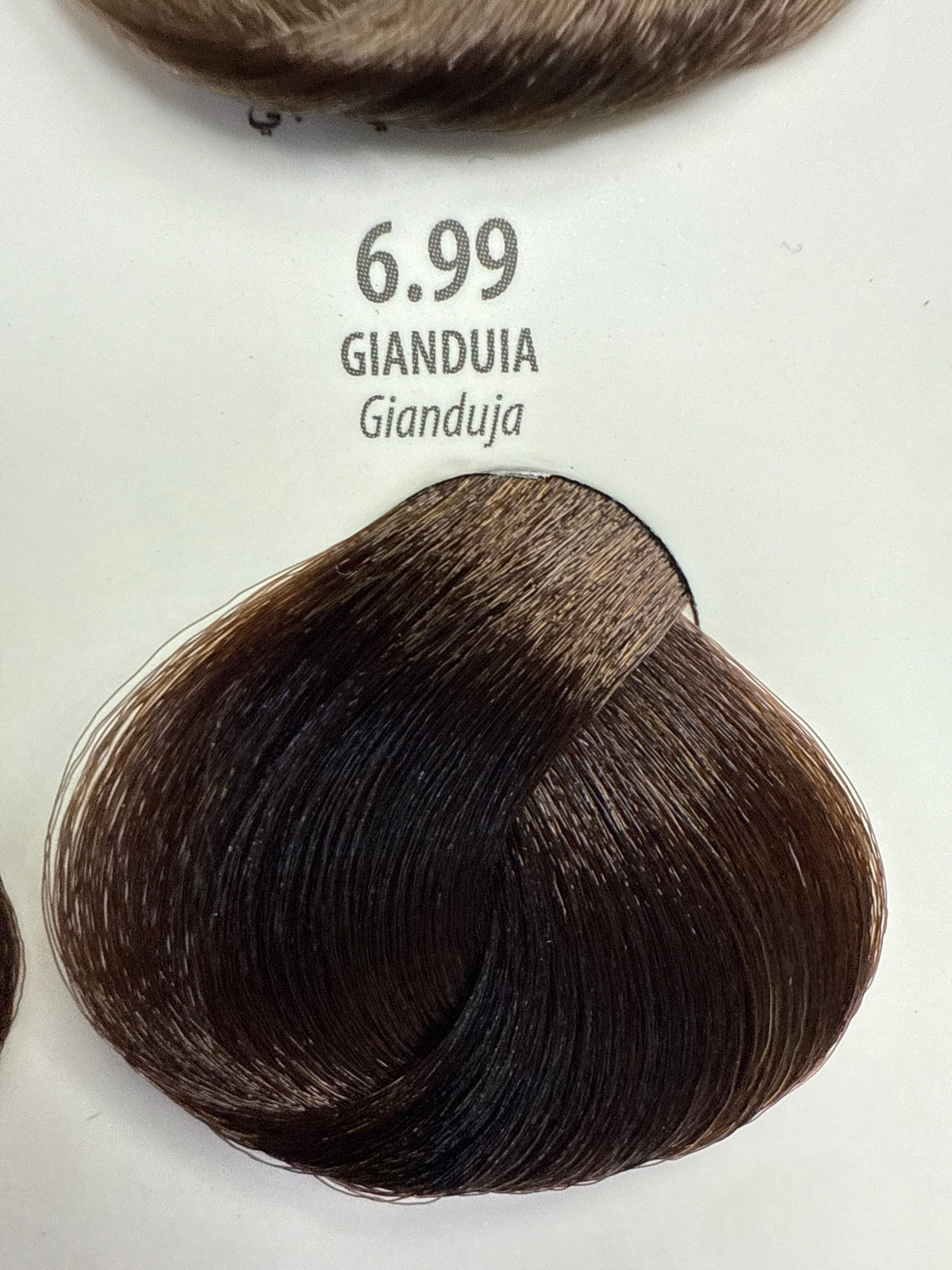 Maxima Professional Plex hair coloring cream in 2CFC0DC0-C09C-4378-B6D4-99761260D354, showcasing the vibrant hair color and packaging.
