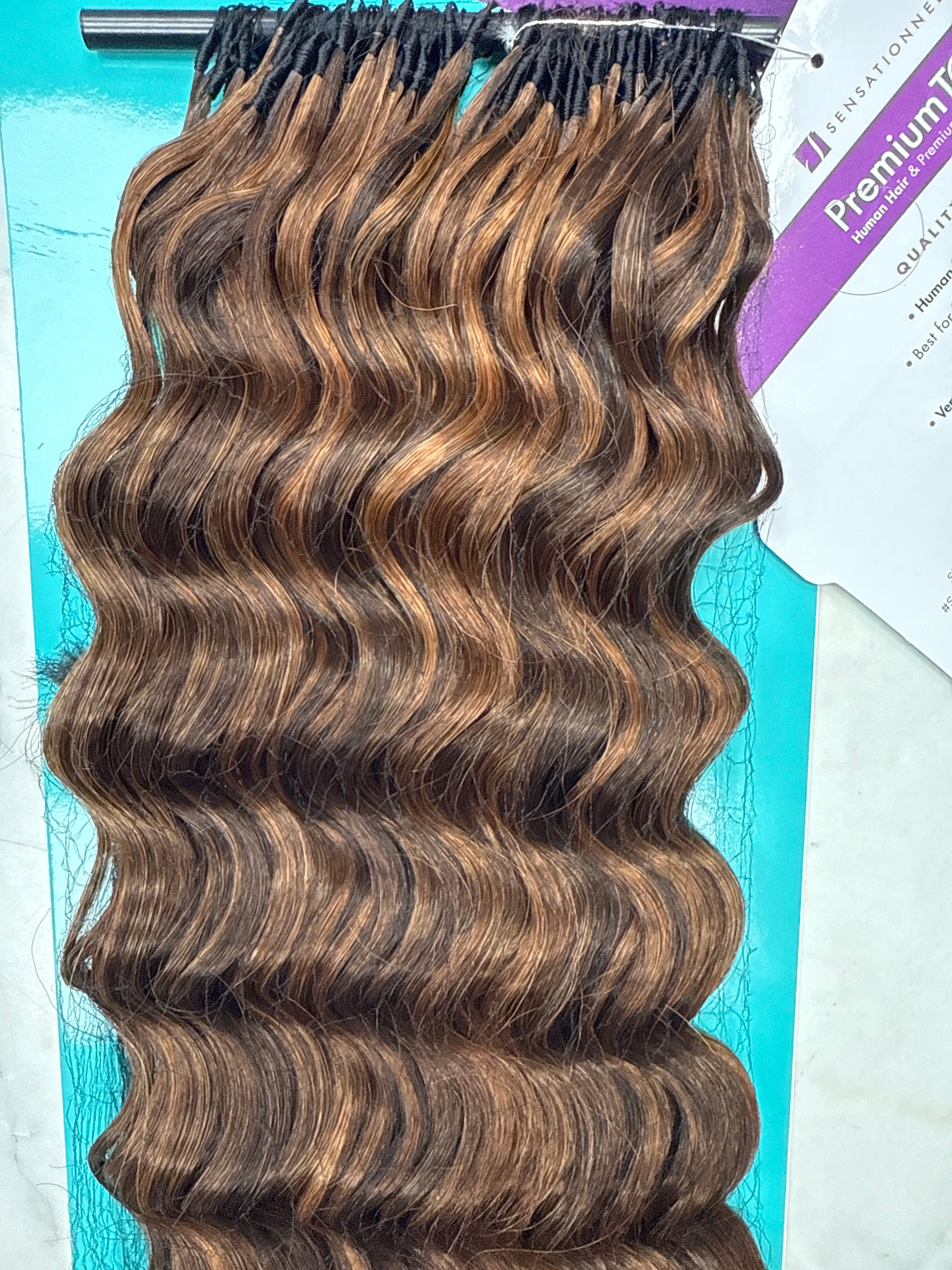 Premium Too Blend Feather Crochet deep wave hair extensions in 14 to 18 inches, showcasing the textured, wavy crochet hair style.