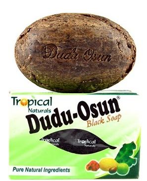 Dudu-Osun Tropical Natural Black Soap 150g by Tropical Naturals, showing the black soap bar in a natural setting.